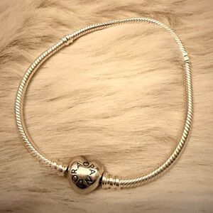 Pandora Sterling Silver Moments Charm Bracelet with heart clasp.